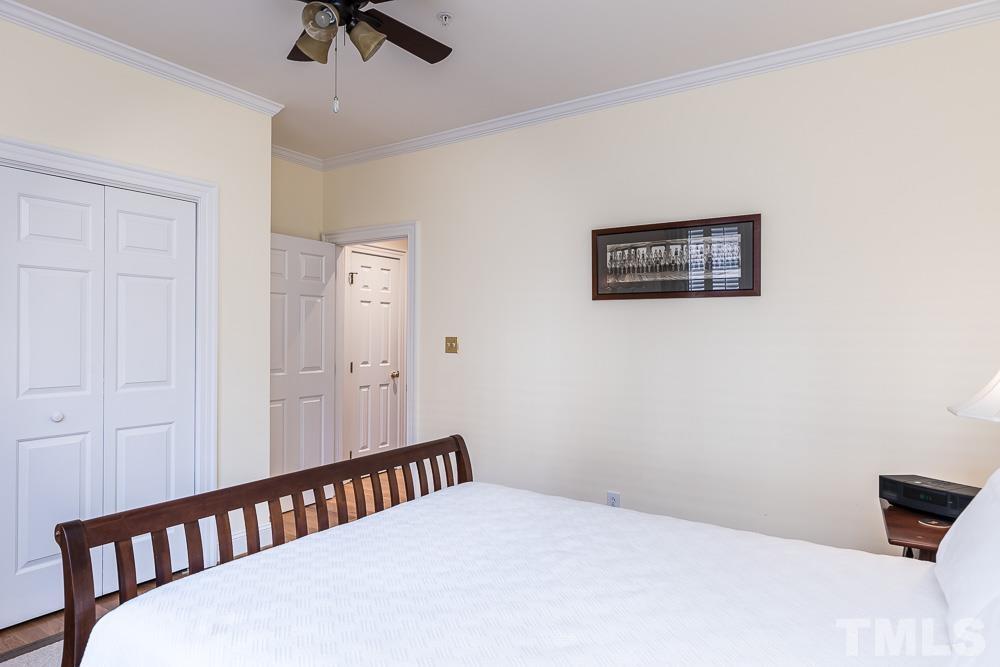 100 Edenburgh Road, Unit 203 Raleigh, NC 27608 - Photo 23 of 26 a view of a hallway with a workspace
