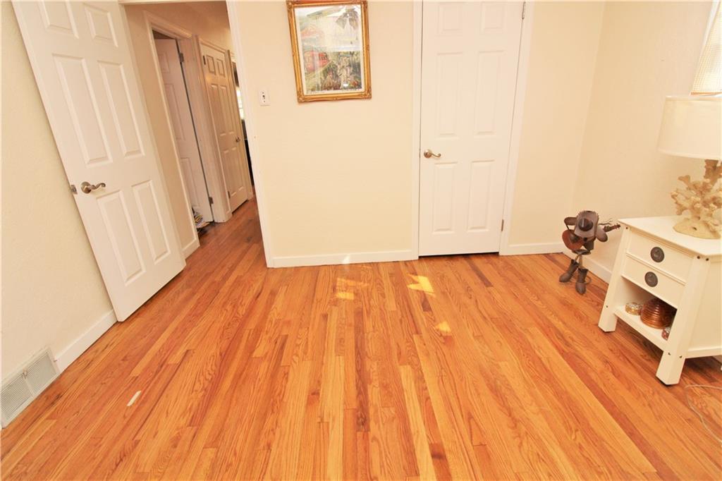 1222 Silver Lane McKees Rocks, PA 15136 - Photo 12 of 20 Main floor additional room with gleaming hardwood floors