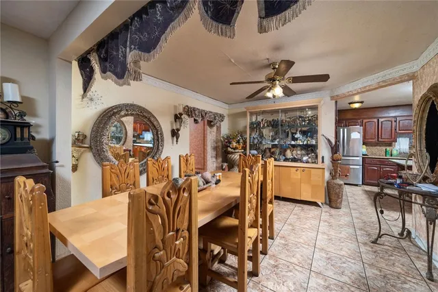 a view of a dining room with furniture window and outside view