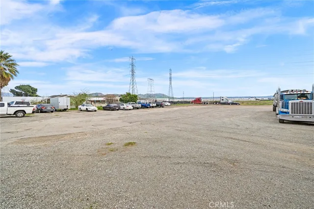 a view of cars parked in front of a building
