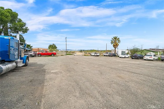 an aerial view of a city with mountains