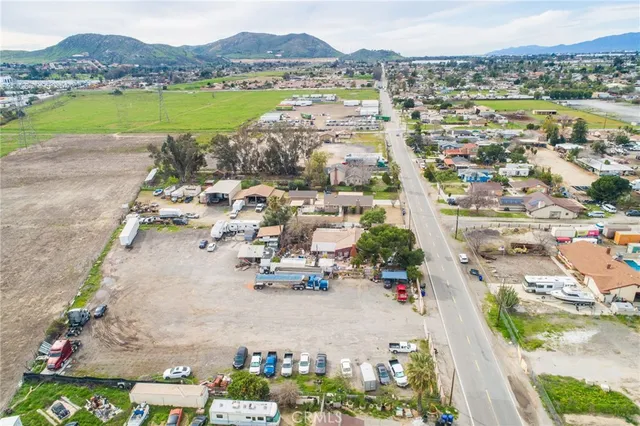 an aerial view of a house with outdoor space