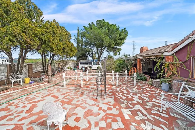 a outdoor space with lots of trees in the background