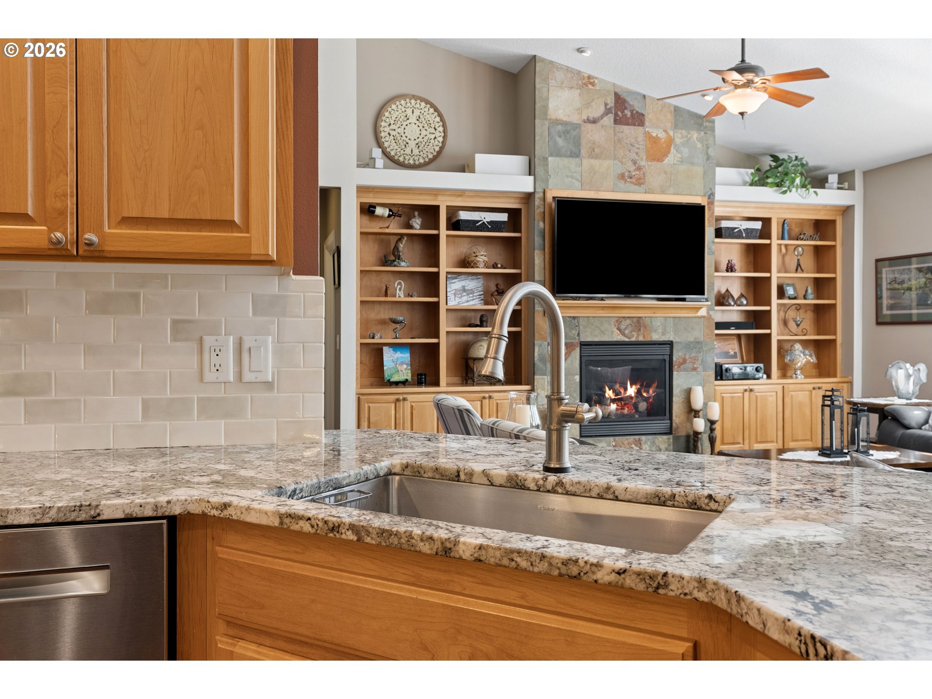 945 Northwest Angel Heights Road Stevenson, WA 98648 - Photo 16 of 41 a kitchen with granite countertop a stove and a sink