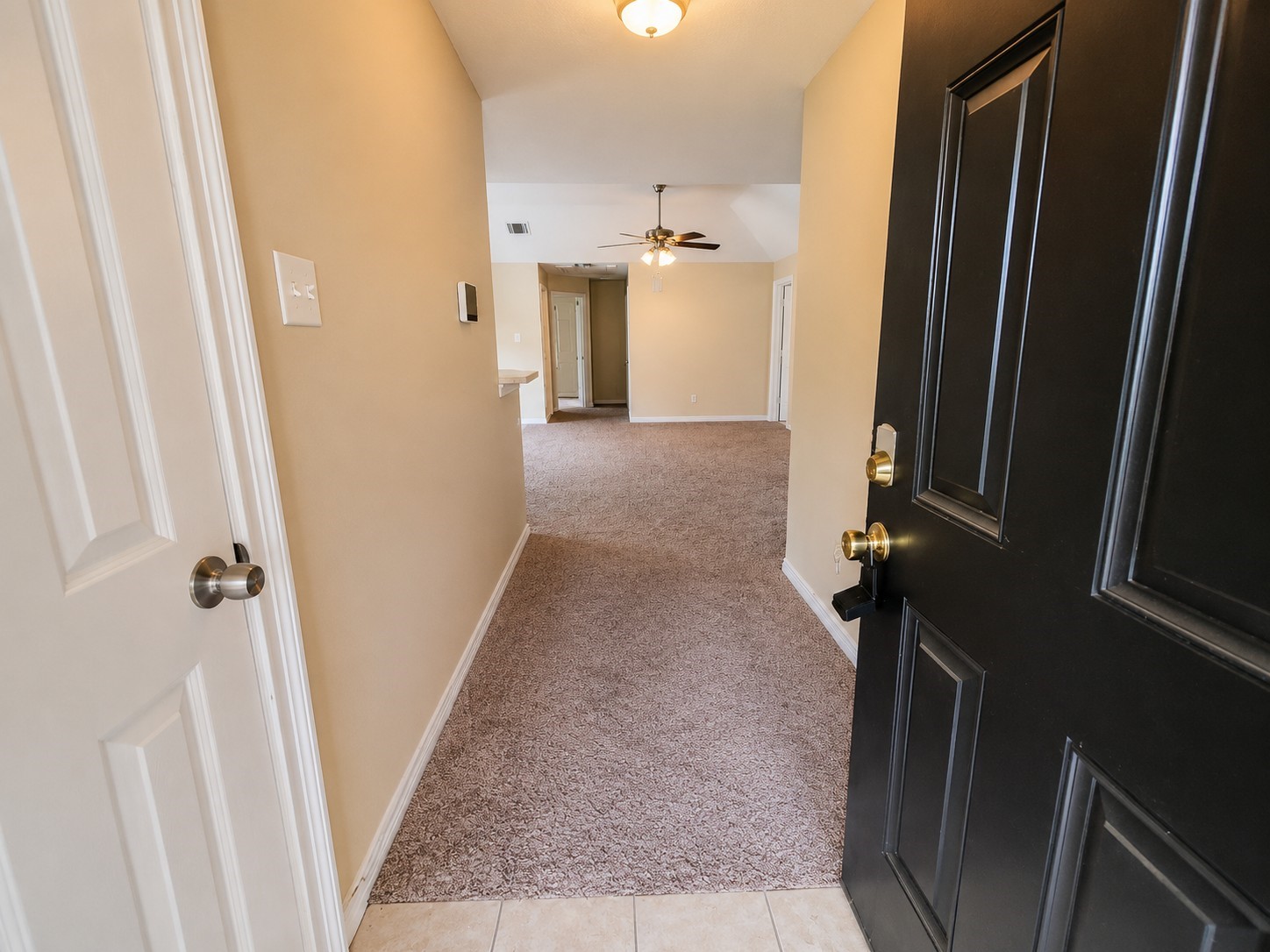 12926 Abalone Way Houston, TX 77044 - Photo 2 of 15 a view of a hallway with a room