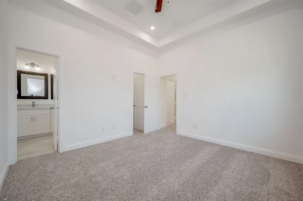 an empty room with a bathroom