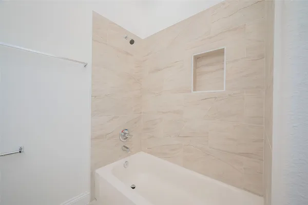 a bathroom with a bathtub