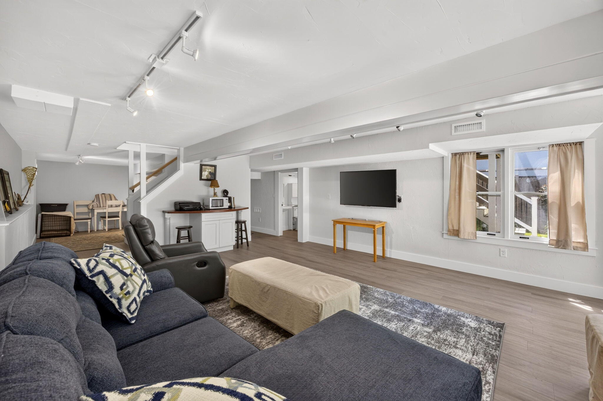 35 Debs Hill Road, Unit 35 Yarmouth Port, MA 02675 - Photo 17 of 36 a living room with furniture and a flat screen tv