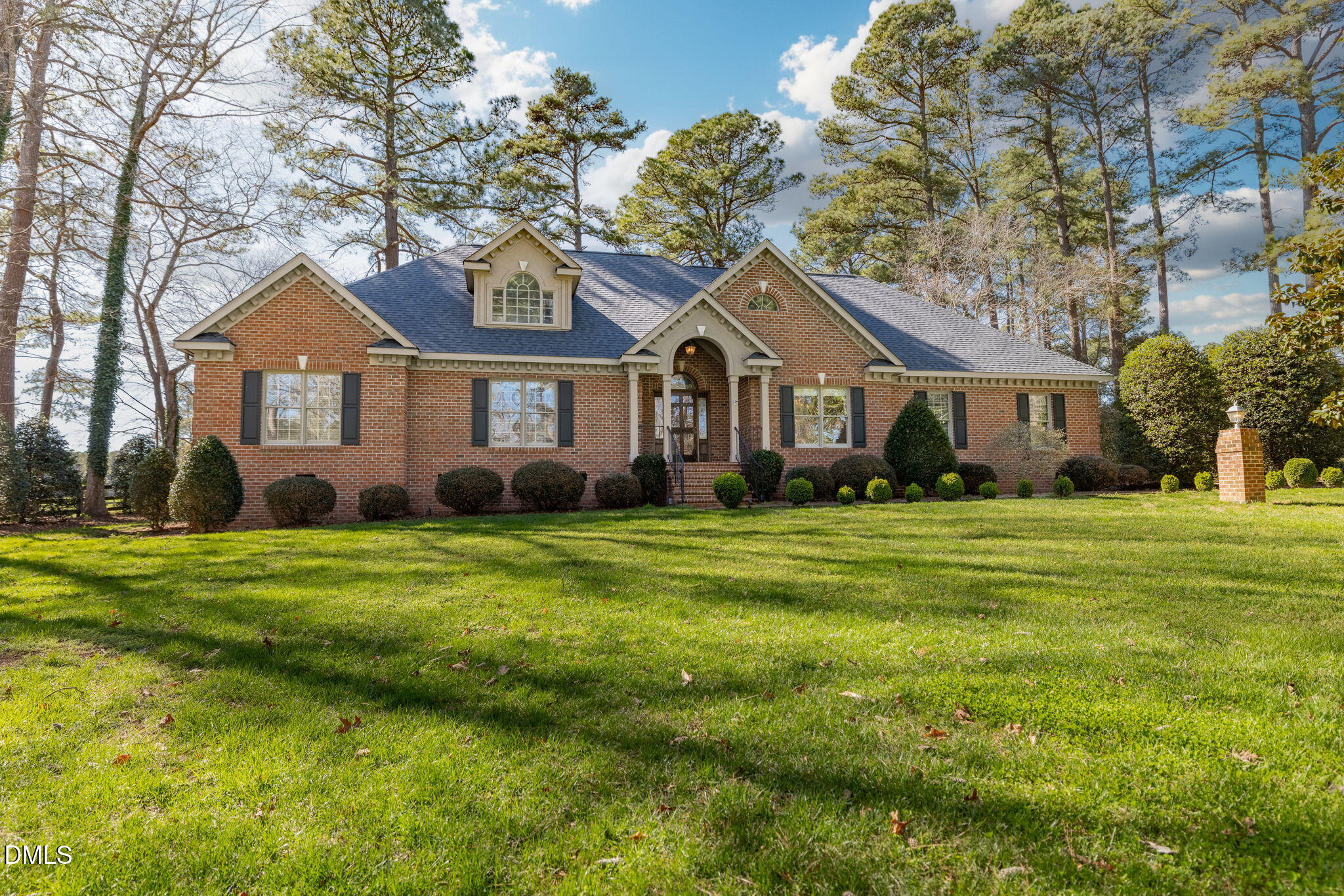 4076 Salem Farm Road Oxford, NC 27565 - Photo 3 of 55 a front view of a house with a garden
