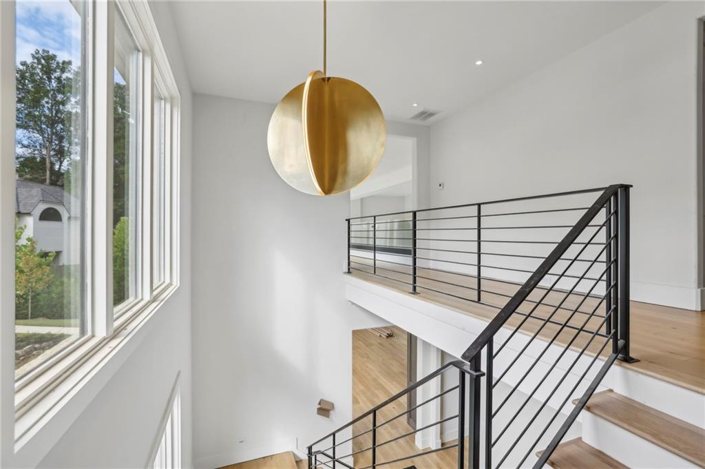 825 Kenry Court Atlanta, GA 30342 - Photo 29 of 50 a view of entryway and hall with wooden floor