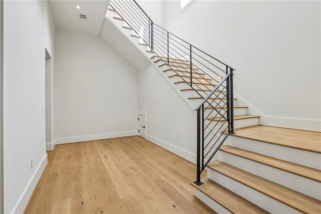 825 Kenry Court Atlanta, GA 30342 - Photo 36 of 50 a view of entryway and hall with wooden floor