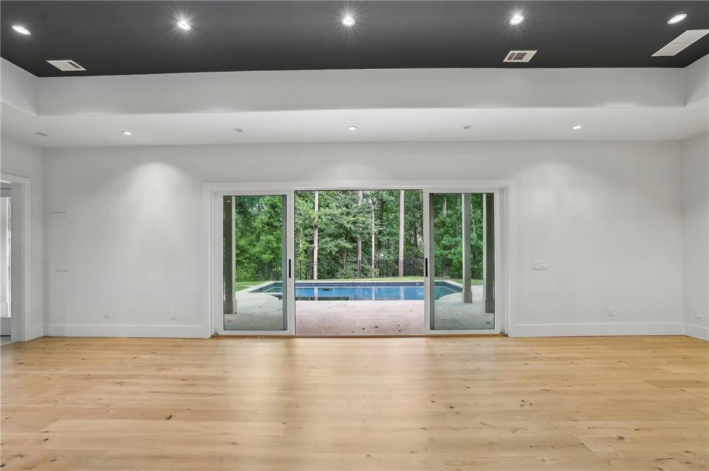 825 Kenry Court Atlanta, GA 30342 - Photo 40 of 50 a view of an empty room with a window