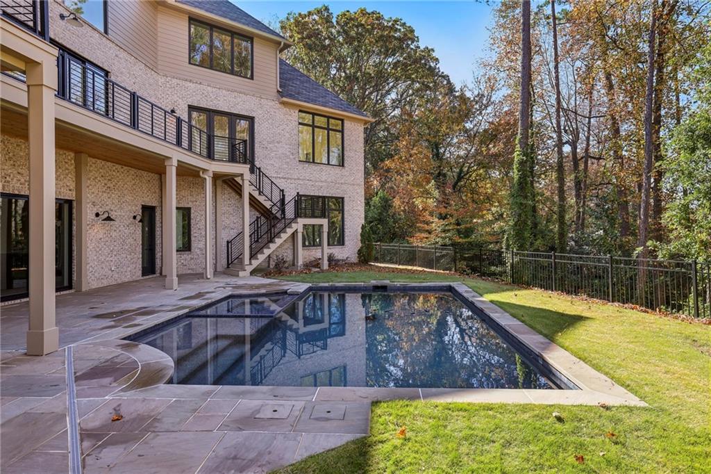 825 Kenry Court Atlanta, GA 30342 - Photo 47 of 50 a view of a house with pool