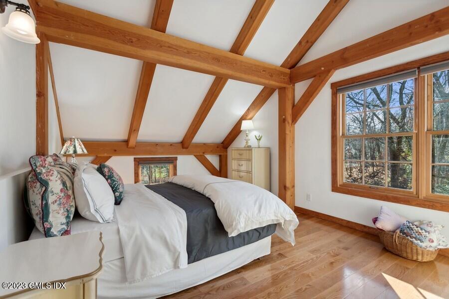 96 Cat Rock Road Cos Cob, CT 06807 - Photo 18 of 38 a bedroom with a bed and a window