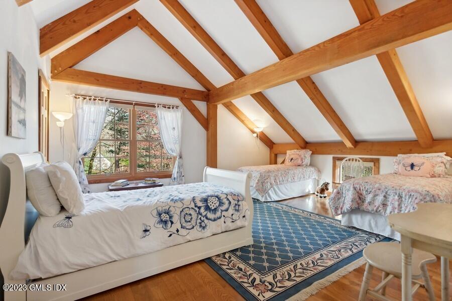 96 Cat Rock Road Cos Cob, CT 06807 - Photo 20 of 38 a living room with a couch and a table