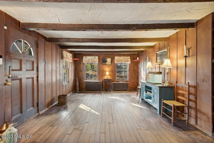 96 Cat Rock Road Cos Cob, CT 06807 - Photo 26 of 38 a view of a livingroom with furniture wooden floor and furniture