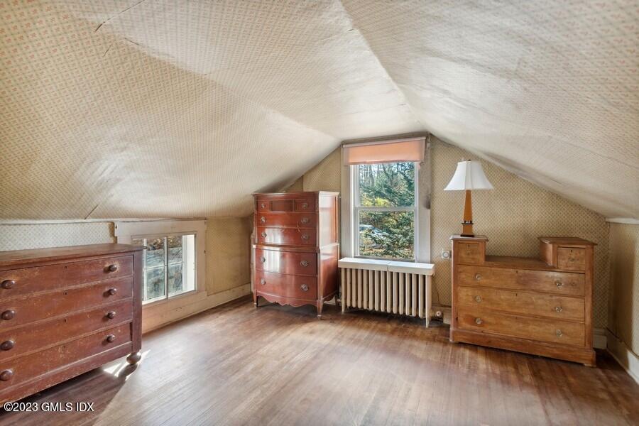 96 Cat Rock Road Cos Cob, CT 06807 - Photo 29 of 38 a view of livingroom with furniture and windows