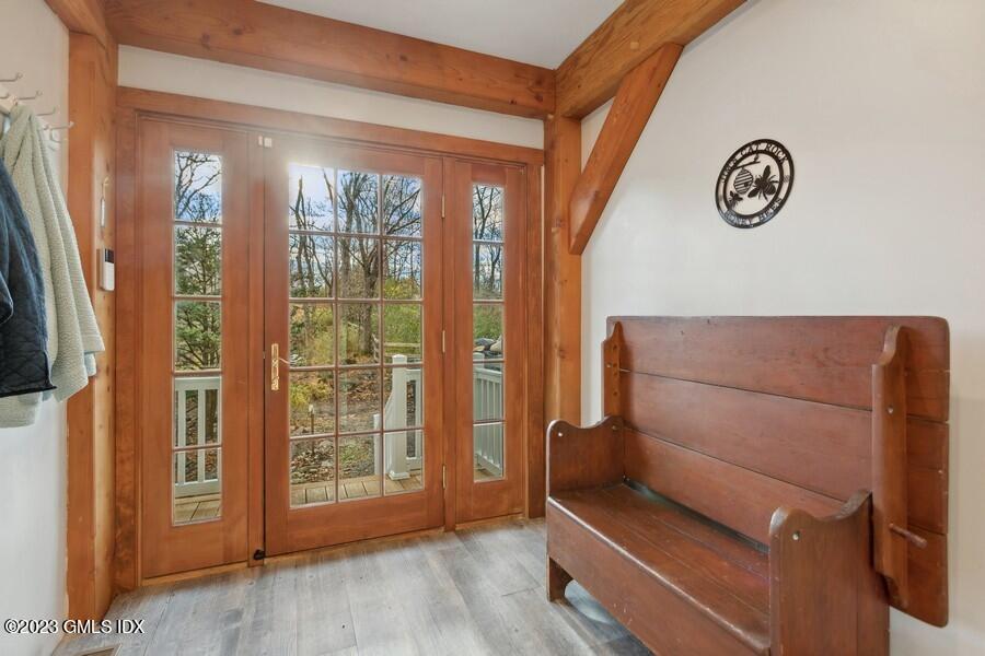96 Cat Rock Road Cos Cob, CT 06807 - Photo 3 of 38 a view of livingroom with furniture and windows