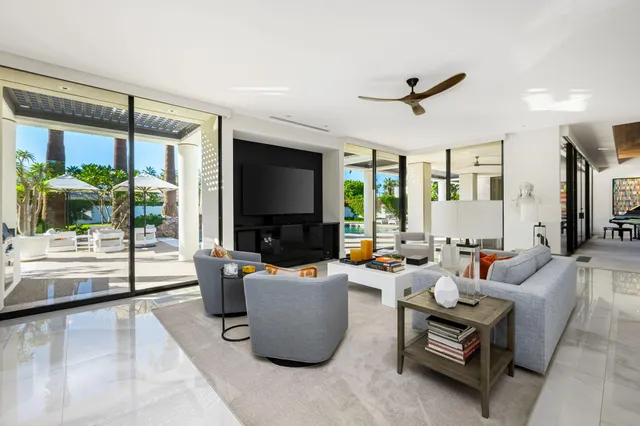 a bathroom with double sink and a mirror