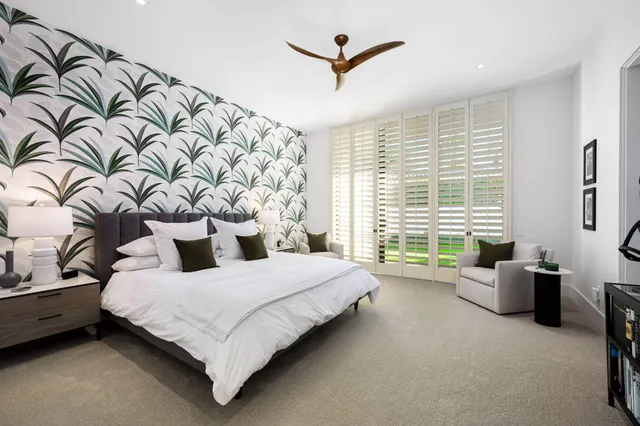 a view of multiple houses with yard