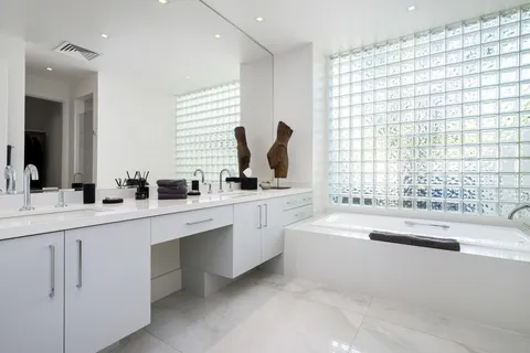 a view of a chairs and table in a garden