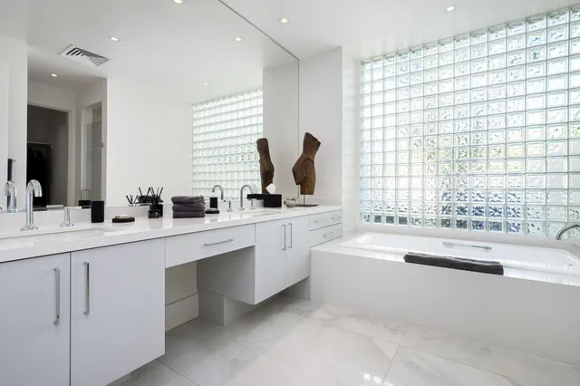 a view of a chairs and table in a garden