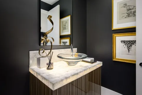 a view of a house with fountain bath tub and fire pit