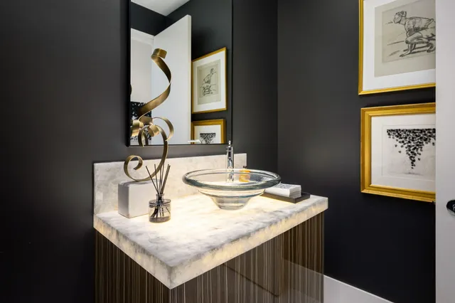 a view of a house with fountain bath tub and fire pit