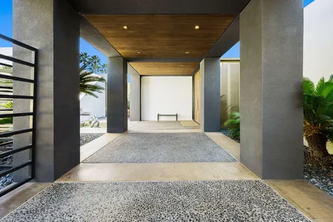 a living room with fireplace furniture and a flat screen tv