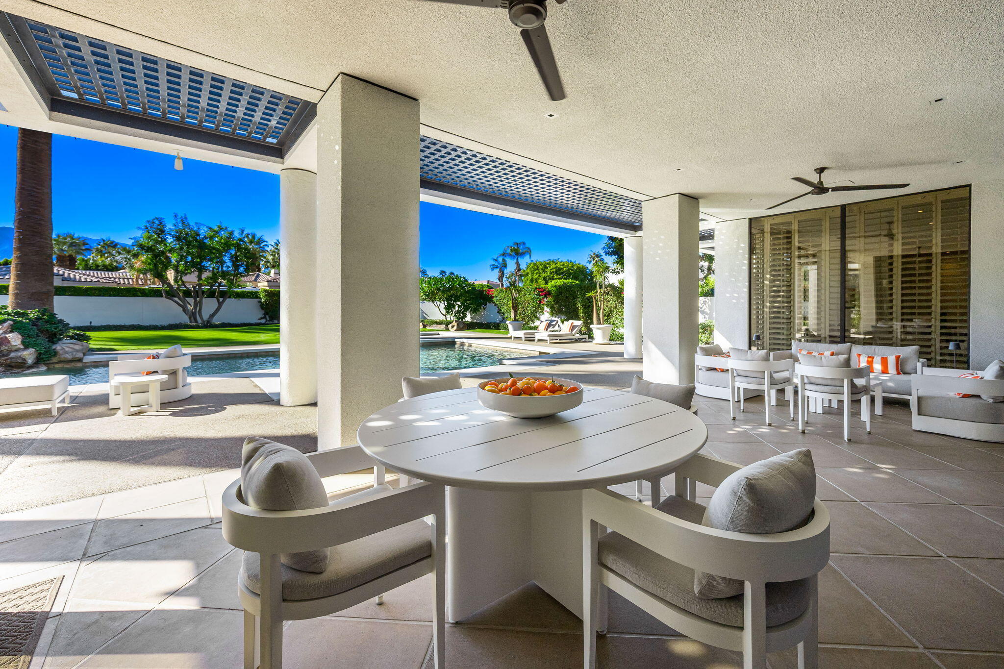 40590 Morningstar Road Rancho Mirage, CA 92270 - Photo 54 of 76 a kitchen with a table and chairs
