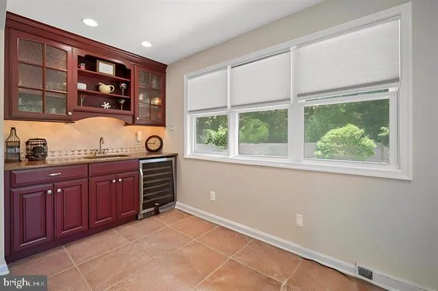 a view of cabinets and window