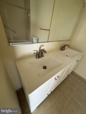 a bathroom with a bathtub and a sink
