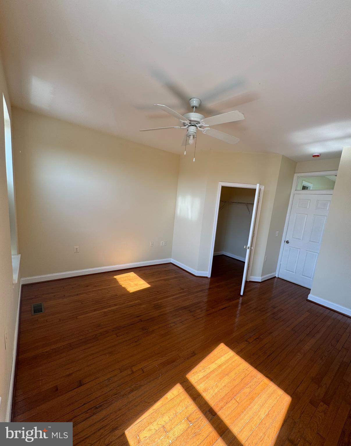 808 East Preston Street Baltimore, MD 21202 - Photo 14 of 20 a view of an empty room and wooden floor
