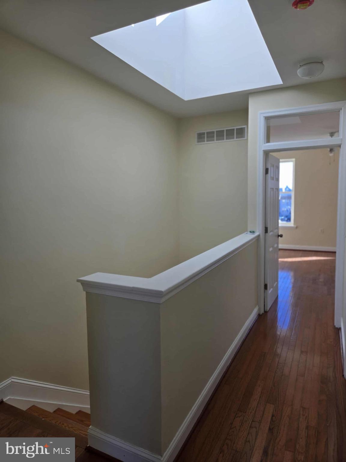 808 East Preston Street Baltimore, MD 21202 - Photo 20 of 20 a view of small space with wooden floor