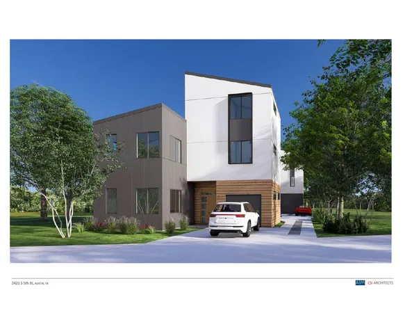 a view of a car in front of a house