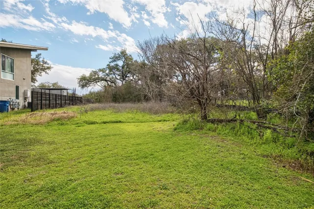 a view of swimming pool with a yard