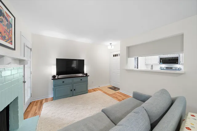 a bedroom with a bed and a television