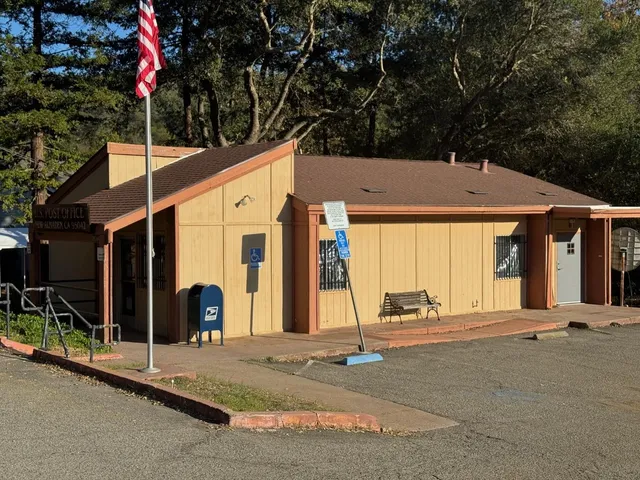 a view of a house with basketball court