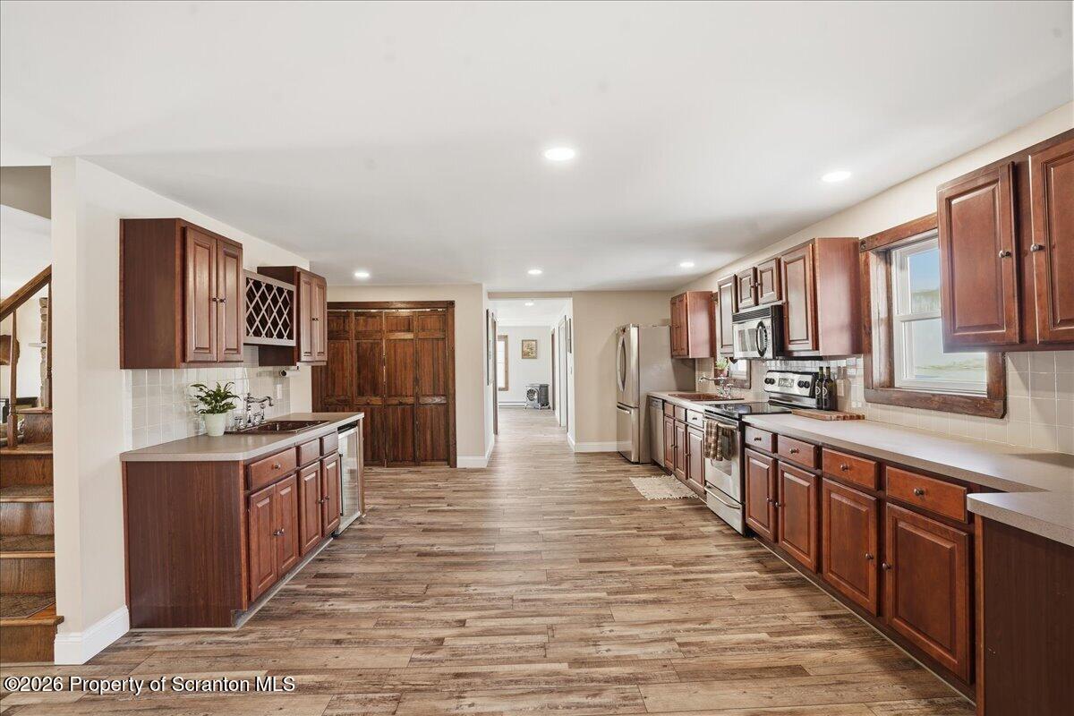 6105 State Rte 2012 Union Dale, PA 18470 - Photo 12 of 79 a large kitchen with stainless steel appliances lots of counter top space