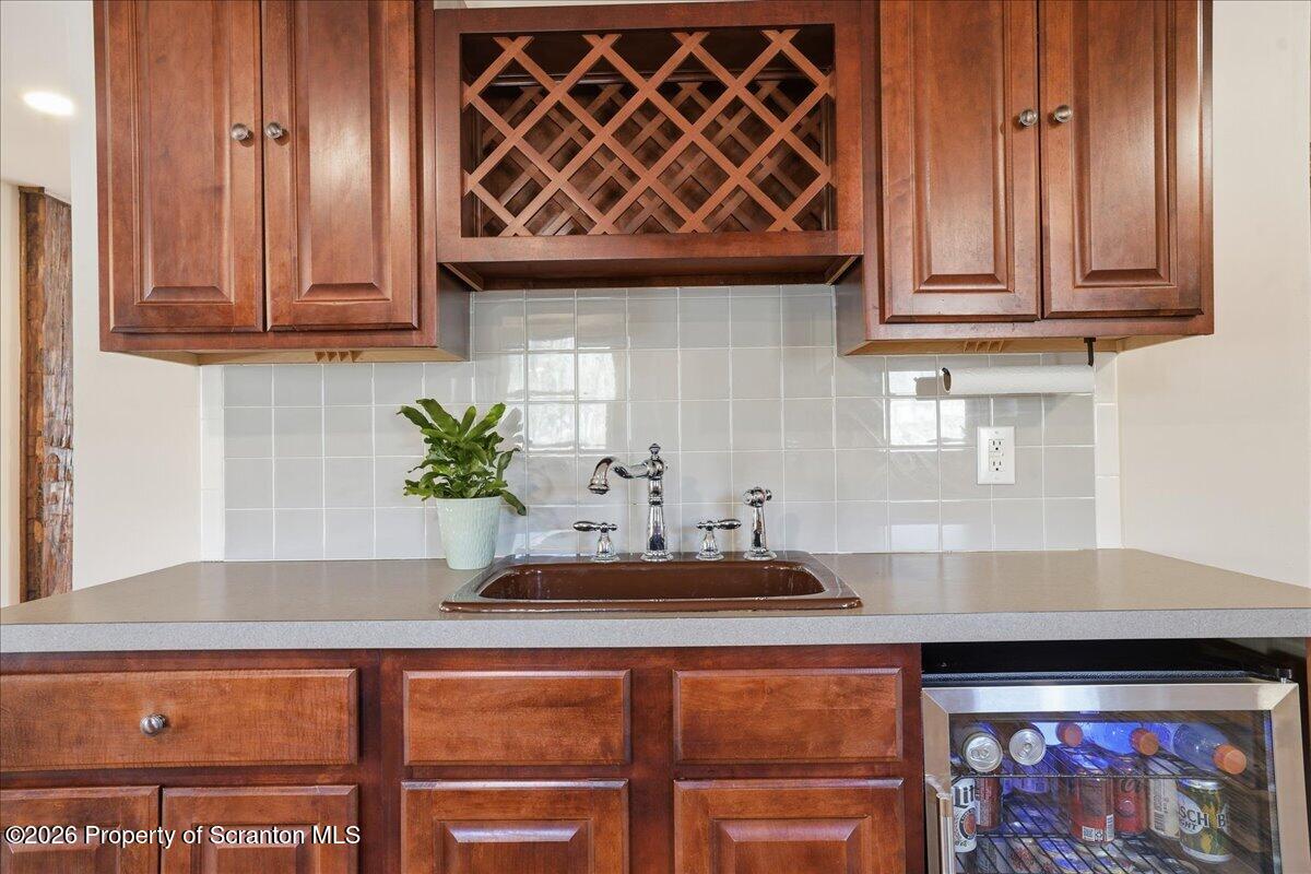 6105 State Rte 2012 Union Dale, PA 18470 - Photo 17 of 79 a kitchen with stainless steel appliances granite countertop a sink a microwave cabinets and wooden floor