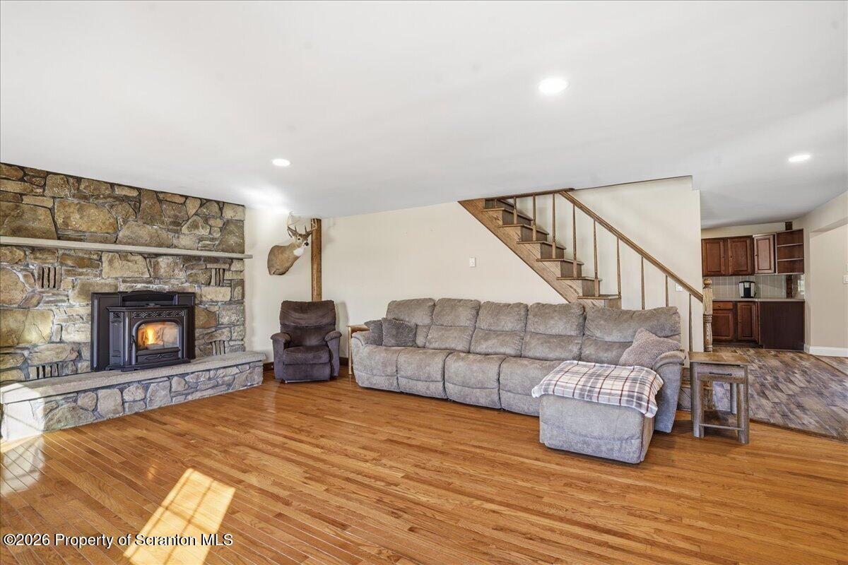 6105 State Rte 2012 Union Dale, PA 18470 - Photo 29 of 79 a living room with furniture and a fireplace