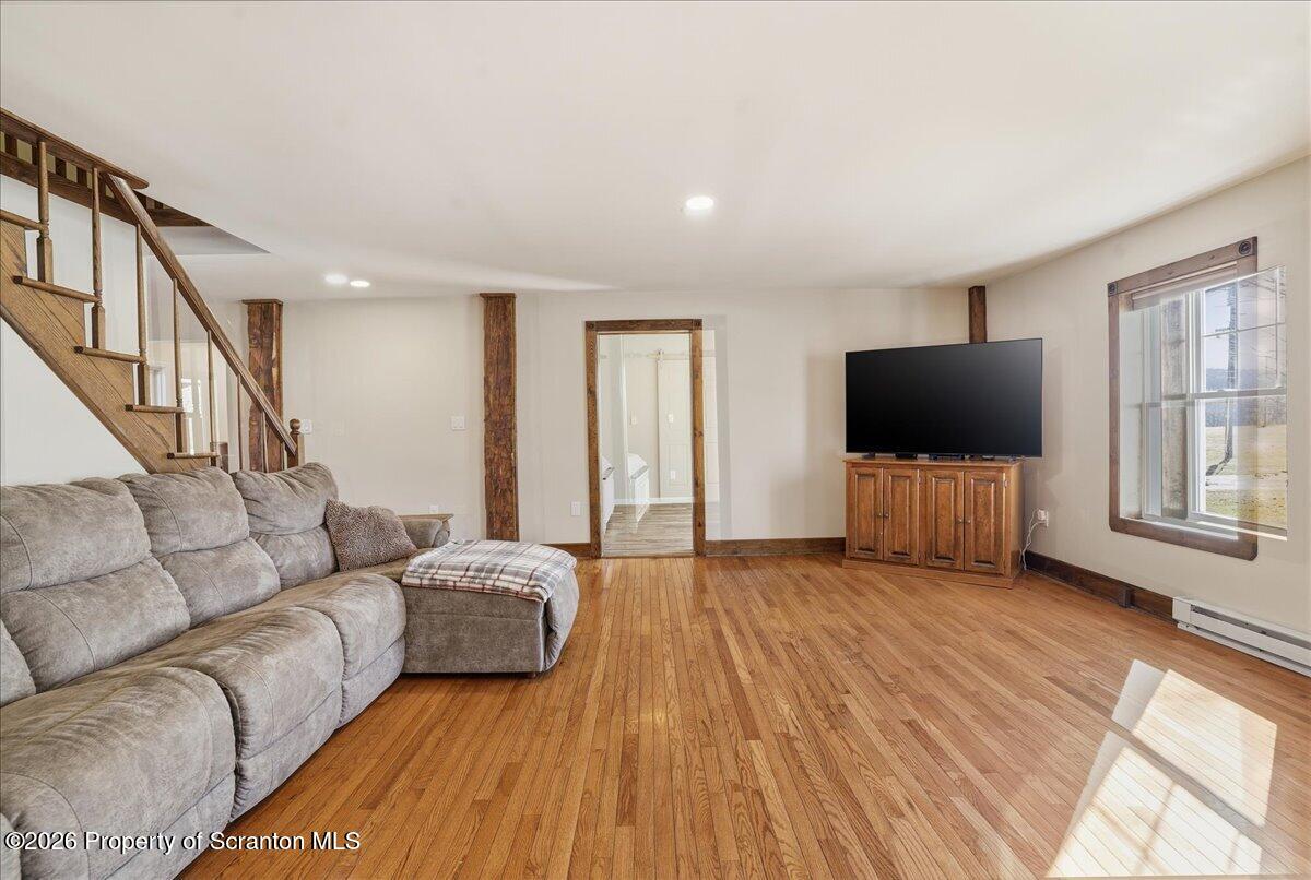 6105 State Rte 2012 Union Dale, PA 18470 - Photo 31 of 79 a living room with furniture and a flat screen tv