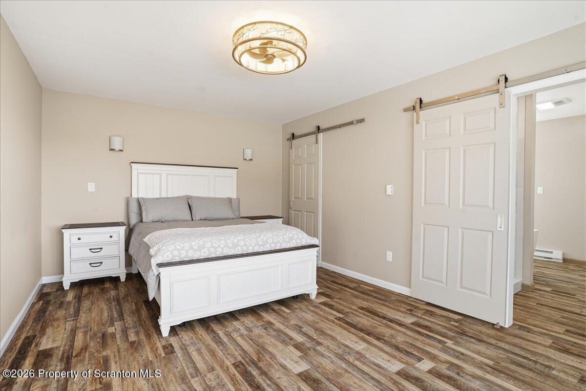 6105 State Rte 2012 Union Dale, PA 18470 - Photo 33 of 79 a bedroom with a bed and a window