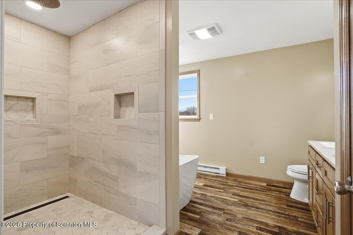 6105 State Rte 2012 Union Dale, PA 18470 - Photo 34 of 79 a bathroom with a sink and a toilet