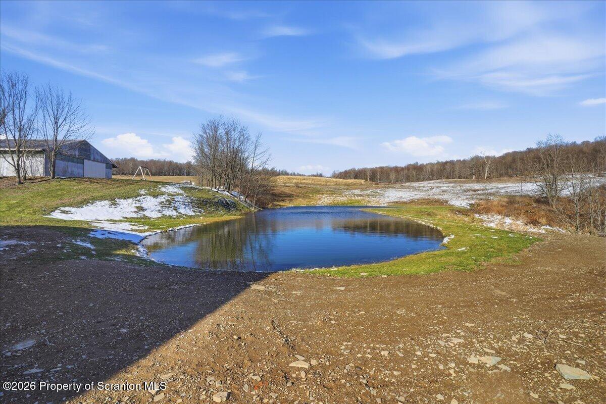 6105 State Rte 2012 Union Dale, PA 18470 - Photo 53 of 79 a view of a lake with mountains in the background