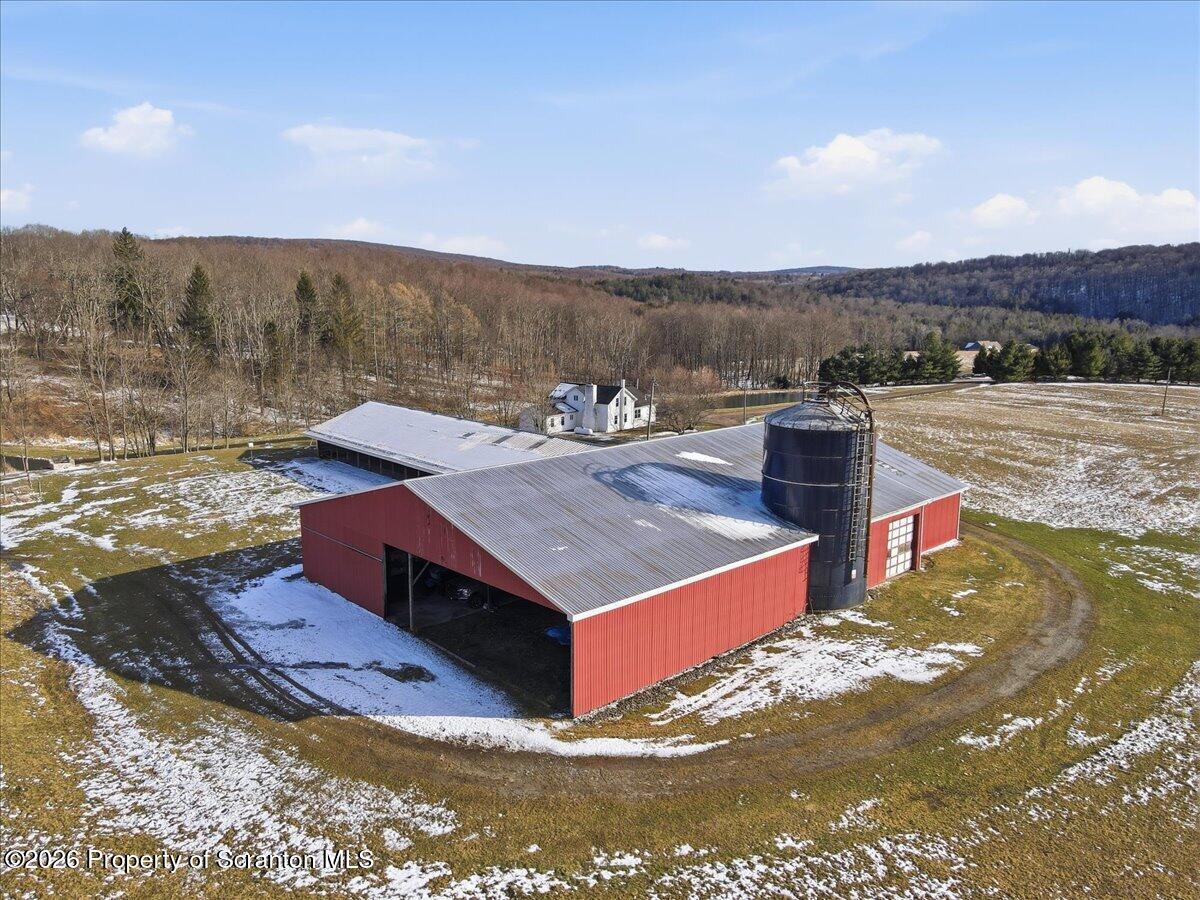 6105 State Rte 2012 Union Dale, PA 18470 - Photo 56 of 79 a view of a terrace with a table and chairs