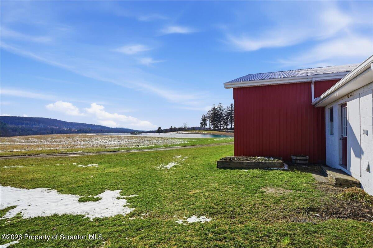 6105 State Rte 2012 Union Dale, PA 18470 - Photo 59 of 79 a view of a swimming pool with a yard
