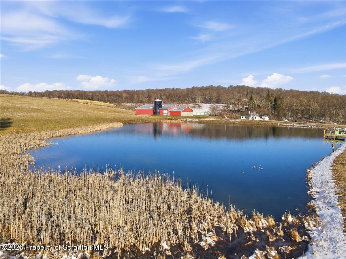 6105 State Rte 2012 Union Dale, PA 18470 - Photo 66 of 79 a view of a lake with houses in the back