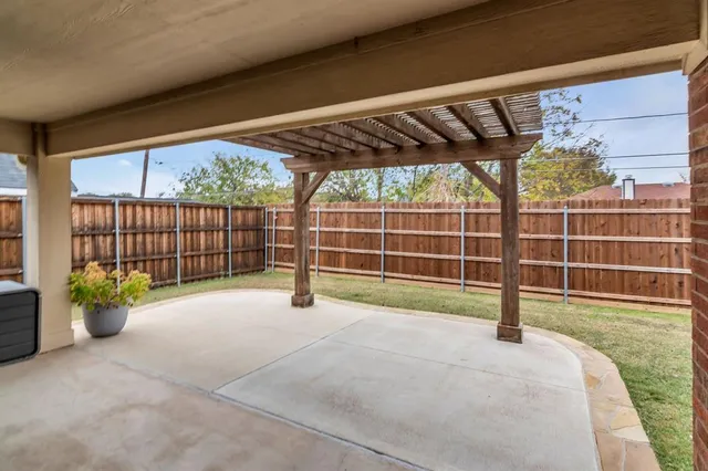 a kitchen with stainless steel appliances granite countertop a stove a microwave and cabinets