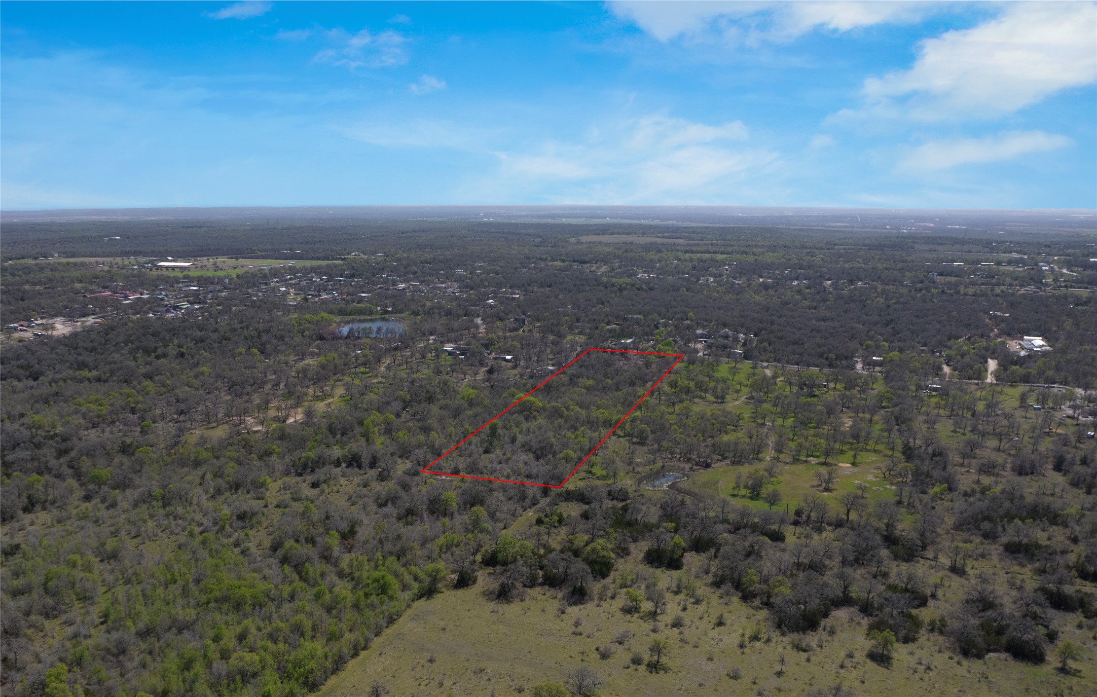 20600 Trappers Trail Manor, TX 78653 - Photo 7 of 7 Bird's eye view featuring a forest view